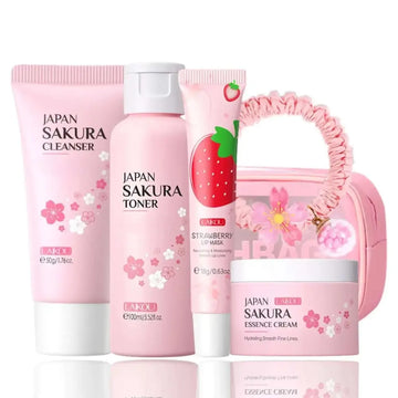 Cherry blossom skin care set featuring pink sakura cleanser 50g, essence cream, strawberry lip mask, and ruffled pouch