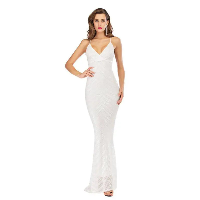 A shimmering stretch sequined mopping dress in metallic silver and rose gold with a bold chevron pattern