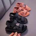 Black childrens peach breathable casual shoes with adjustable velcro straps and thick cushioned sole for school use