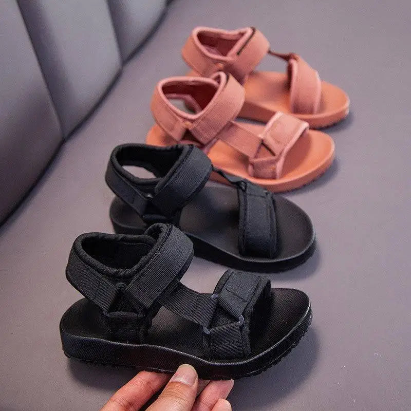 Black childrens peach breathable casual shoes with adjustable velcro straps and thick cushioned sole for school use