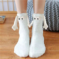 White plush warm slipper socks with magnetic suction couple design featuring cute cartoon faces and bone-like arms