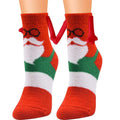 Christmas supplies magnetic suction couple socks in red green and white plush with santa claus design and red ribbon ties