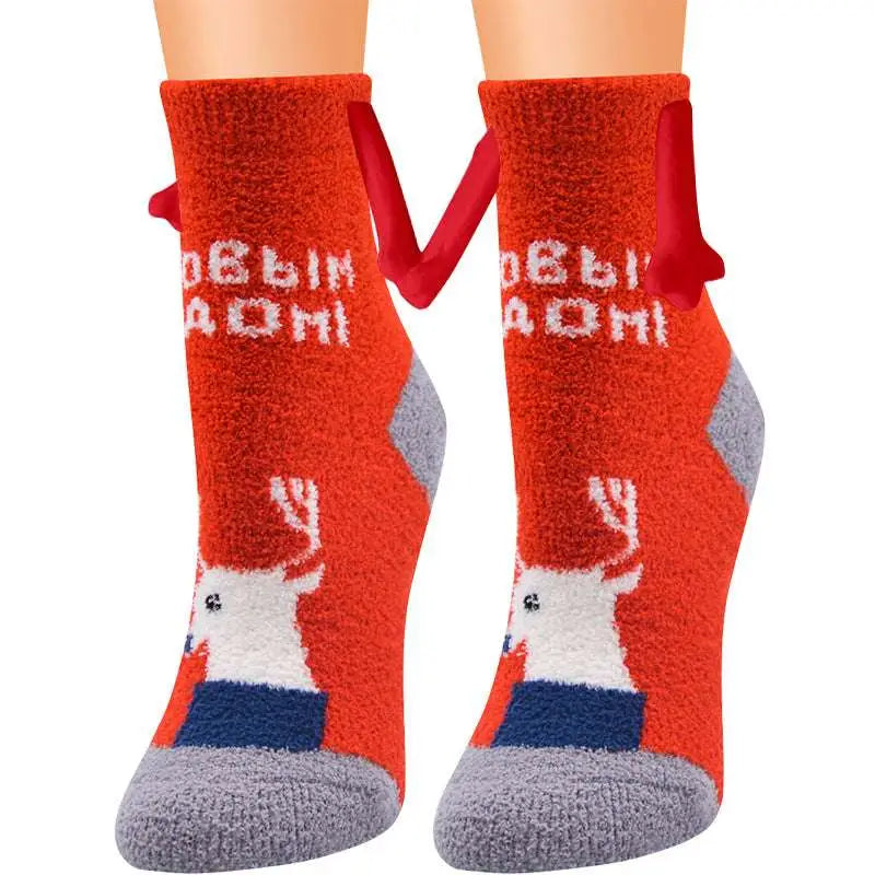Red plush warm slipper socks with white reindeer gray accents featuring magnetic suction couple design