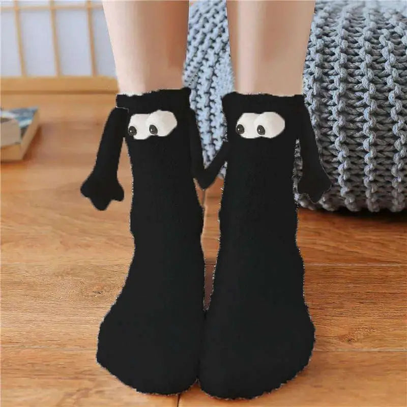 Black knit warm slipper socks with playful cartoon dog faces and floppy ears from christmas supplies magnetic suction couple
