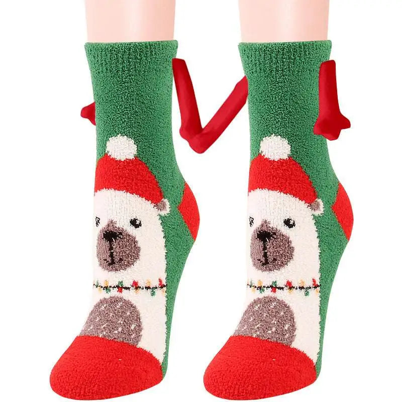 Green and red warm slipper socks with plush polar bear wearing santa hat and reindeer antlers magnetic suction couple design