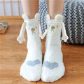White fluffy warm slipper socks with bear ears, embroidered golden faces, and light blue heart patches for magnetic suction couple use