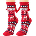 Red christmas-themed warm slipper socks with magnetic suction couple feature and reindeer white navy patterns