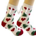 White fluffy christmas-themed warm slipper socks with red hearts green trees and magnetic suction couple bone tabs
