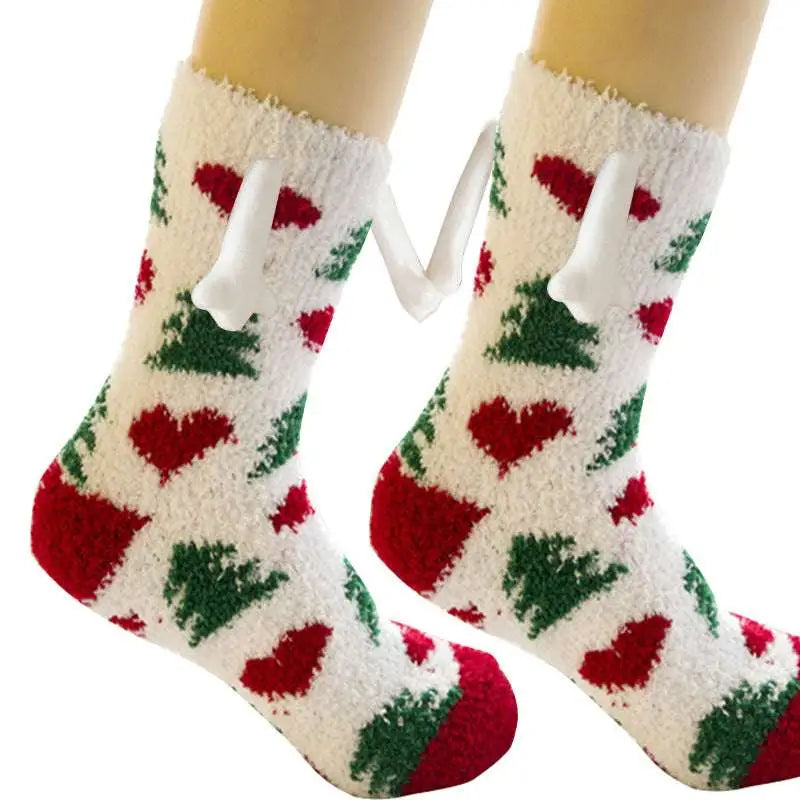 White fluffy christmas-themed warm slipper socks with red hearts green trees and magnetic suction couple bone tabs