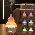 White ceramic christmas tree essential oil aroma diffuser humidifier with star topper and warm ambient light tiers