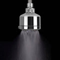 Chrome plastic small shower head with sleek cylindrical design and adjustable spray pattern in chrome finish