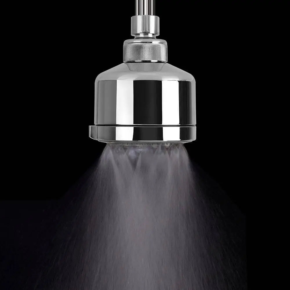 Chrome plastic small shower head with sleek cylindrical design and adjustable spray pattern in chrome finish