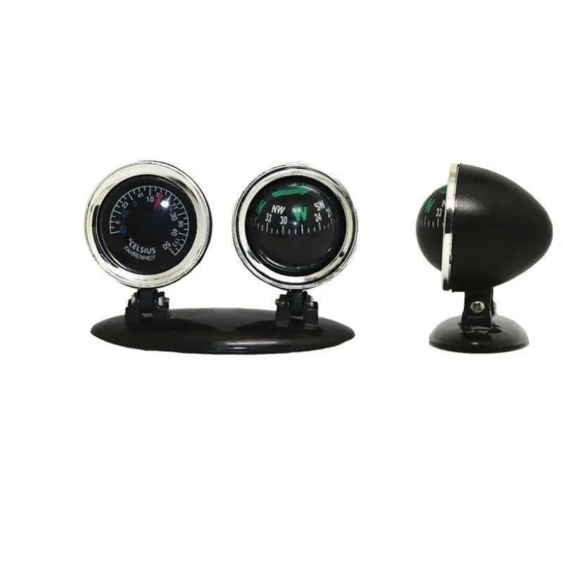 Black and silver chrome speedometer car compass dashboard gauge with circular compass and green directional markings