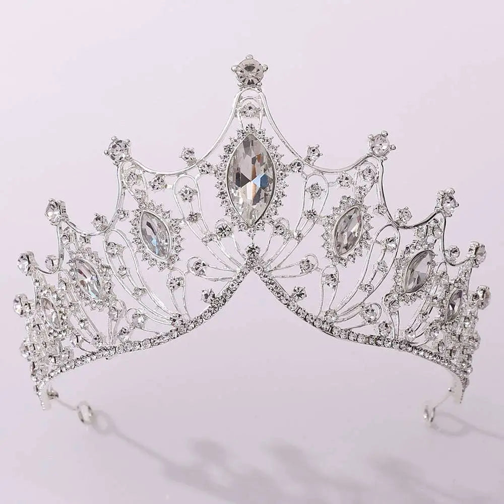 A classic vintage bridal tiara adorned with sparkling clear crystals and large marquise-cut stones in silver