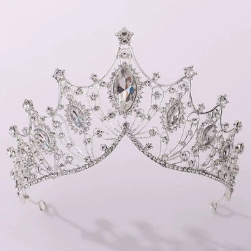 A classic vintage bridal tiara adorned with sparkling clear crystals and large marquise-cut stones in silver