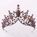 Classic vintage bridal tiara in rose gold adorned with marquise-cut pink and black gemstones and sparkling clear crystals