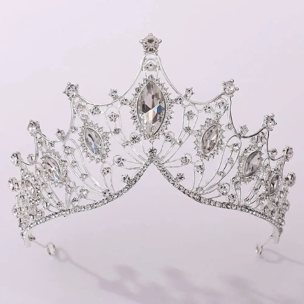 Classic vintage bridal tiara adorned with sparkling clear crystals and intricate silver filigree detailing for weddings