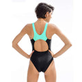 A sleek black color block one piece swimwear women bikini with vibrant turquoise racerback and open back design