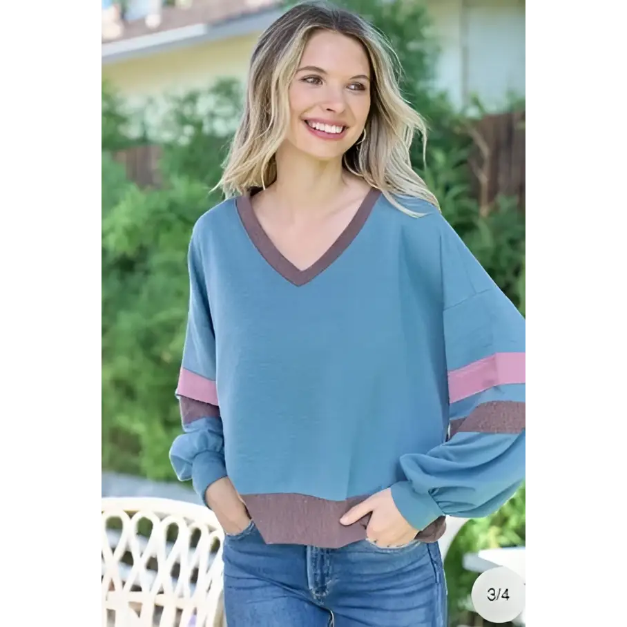 Color block v-neck cropped sweatshirt in soft teal color with pink and brown stripes and relaxed fit