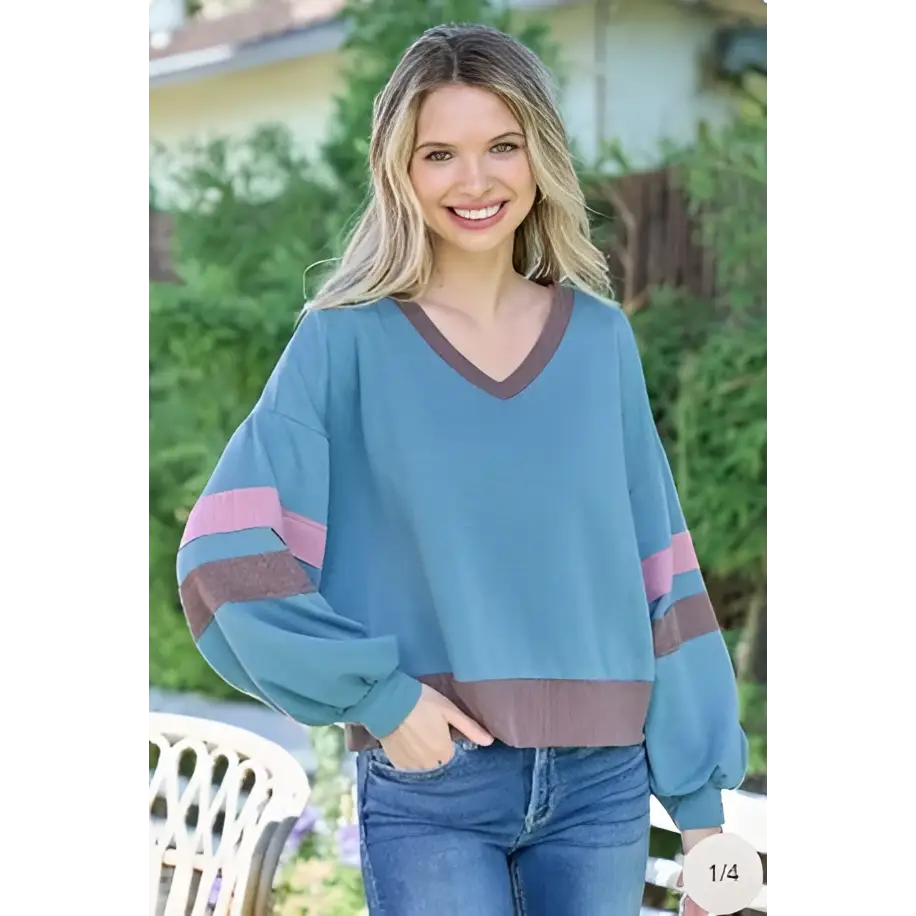 Color block v-neck cropped sweatshirt in soft teal color with pink and brown stripes and relaxed fit
