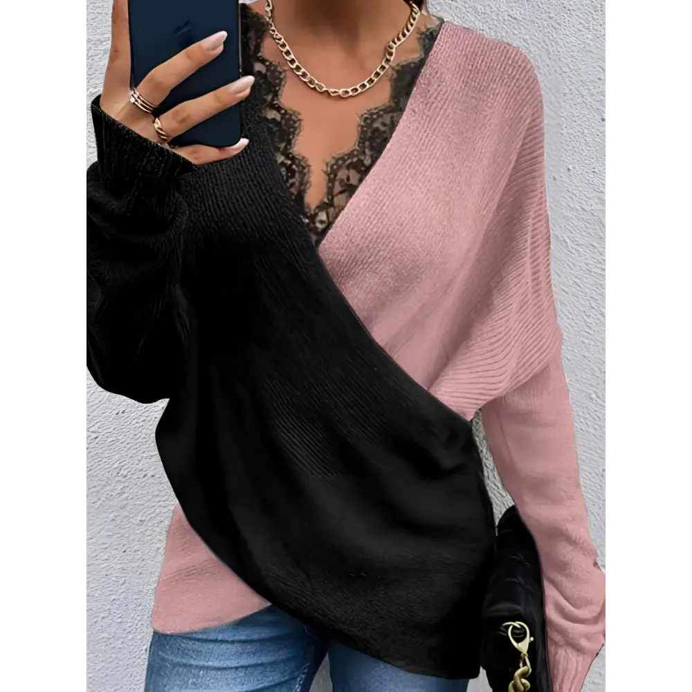 Color blocked lace edge v-neck knit sweater in black and pink with long sleeves and split two-tone design