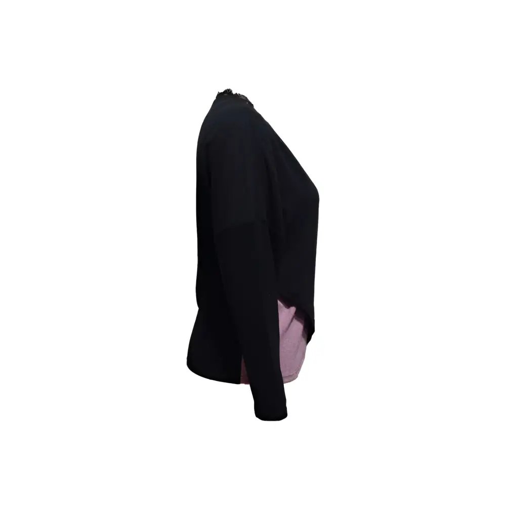 Black long-sleeved color blocked lace edge cardigan with subtle ruffled neckline and lavender textured lining visible