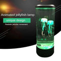 Green-lit changing led jellyfish lamp with realistic movement in clear cylindrical glass container for night light use
