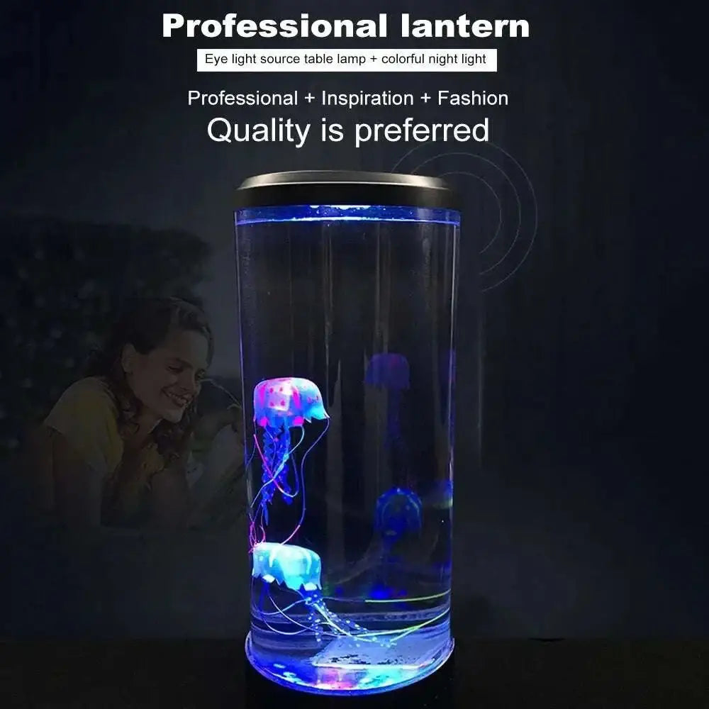Transparent cylindrical led jellyfish lamp with glowing blue and purple jellyfish and metallic silver lid for ambiance lighting
