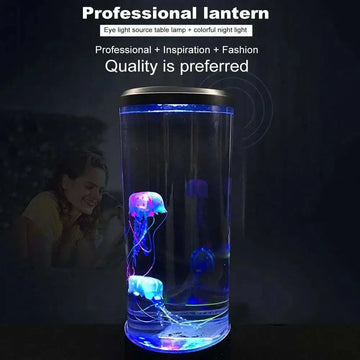 Transparent cylindrical led jellyfish lamp with glowing blue and purple jellyfish and metallic silver lid for ambiance lighting