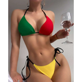 A vibrant color contrast patchwork bikini tether split swimsuit with a green and red top and yellow bottom with black ties