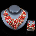 Elegant red and gold colorful exaggerated bride necklace and earring set with teardrop crystals and alloy color plating