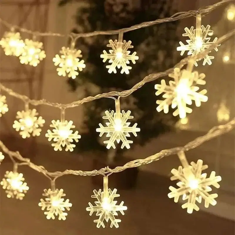 String of warm white colorful led snowflake lights with translucent snowflake-shaped bulbs for festive decor