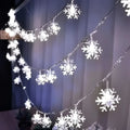 White colorful led snowflake lights with delicate translucent design perfect for festive decoration