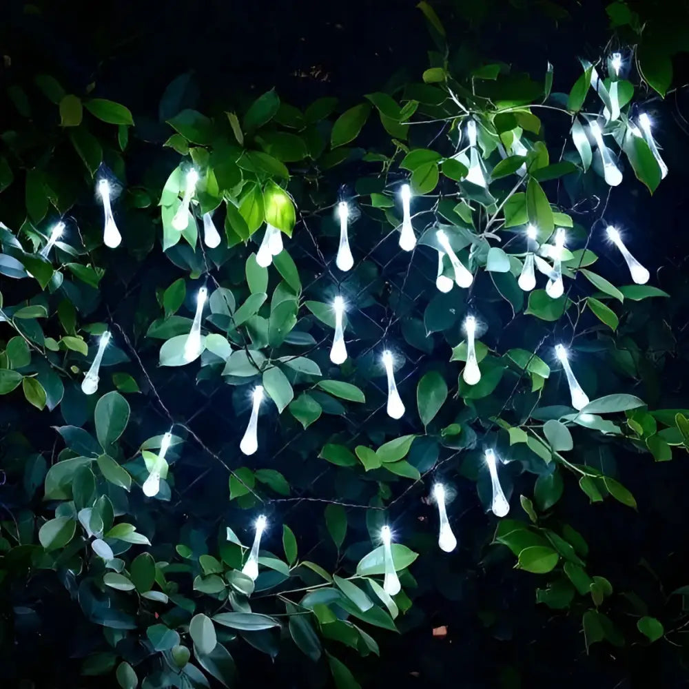 White teardrop colorful teardrop bubble garden solar lights with lighting modes hanging among green leaves