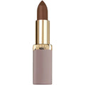A sleek riche ultra matte nude lipstick sienna supreme in matte brown with a gold-toned cap and mauve tube