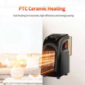 Black compact ceramic heating fan heater with wall-mounted design red power button and glowing heating elements