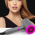 Gray and pink compact folding style hair dryer with spiral vent design and wind nozzle for efficient styling