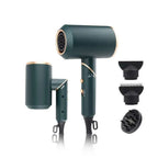 Compact folding style hair dryer in dark green folding with gold accents and wind nozzle multiple attachments