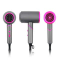 Three sleek compact folding style hair dryers with wind nozzle in matte gray and vibrant pink trim with led details