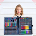 A child holds open a black plastic case of a comprehensive watercolor pen and colorful crayons art kit