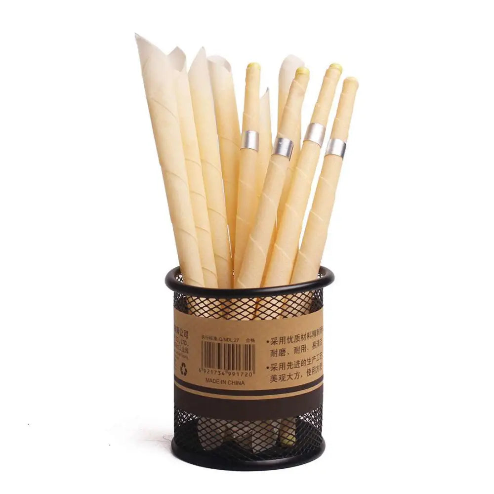 A set of cream-colored twisted paper straws with silver bands for coning beewax natural ear candle ear healthy care use