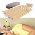 Set of beige coning beewax natural ear candle rods with silver bands for ear healthy care and wax removal treatment