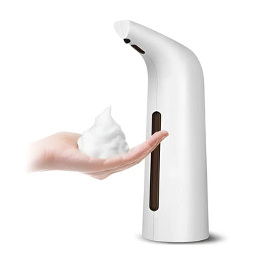 White sleek modern contact-free automatic induction soap dispenser with a touch sensor and brown accent strip