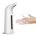 White sleek modern contact-free automatic induction soap dispenser with brown accent strip and sensor-activated nozzle