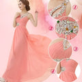 A coral pink embellished chiffon evening dress with silver beading and crystal details for dinner banquet long wear