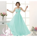 A mint green chiffon evening dress with delicate beaded embellishments along the one-shoulder neckline