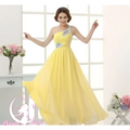 A flowing yellow chiffon evening dress with one-shoulder design and sparkling beaded embellishments on neckline
