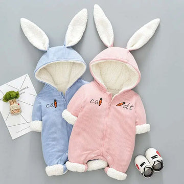 Pink and blue corduroy bunny baby winter clothes onesie with white fleece-lined ears cuffs and hood for warmth