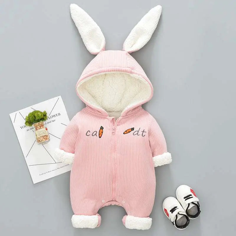 Pink corduroy bunny baby winter clothes onesie with white faux fur trim and carrot embroidery for cold weather use