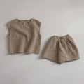 Beige cotton muslin breathable vest shorts set featuring a lightweight sleeveless top and matching shorts